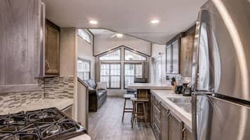 Fridge, microwave, cookware/dishes/utensils