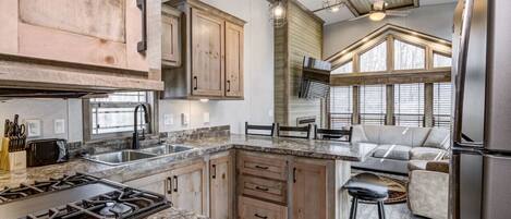 Fridge, microwave, cookware/dishes/utensils