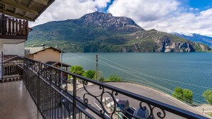 A balcony with a view of a lake and mountains. - Miki Mhouse by Interhome (Lago di Mezzola)