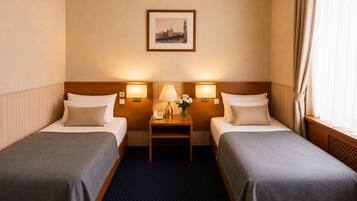 Deluxe Twin Room | Desk, laptop workspace, soundproofing, iron/ironing board (on request)