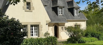 Huge Breton House in the middle of the garden. A bike trail to go to beach