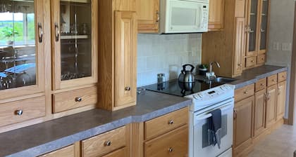 UPNORTH GETAWAY. Spacious 4 bedroom, 3 bathroom. On the ATV/Snowmobile Trails