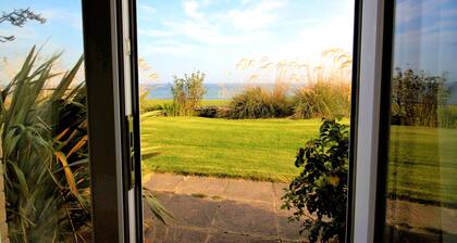 Ground floor 2-bedroom spacious apartment overlooking the famous James Braid Brora Golf Course.