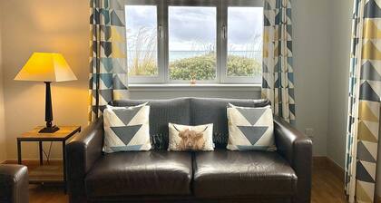 Ground floor 2-bedroom spacious apartment overlooking the famous James Braid Brora Golf Course.