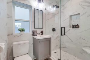 Shower, hair dryer, towels