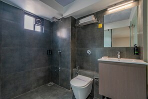 Superior Suite | Bathroom | Hair dryer, slippers