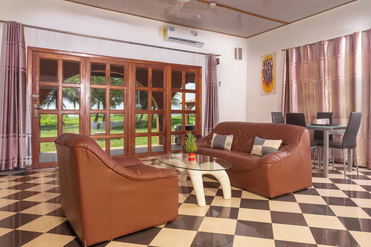 Executive Bungalow, 3 Bedrooms | Living area | 32-inch flat-screen TV with cable channels