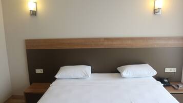 Economy Room, City View | Individually decorated, individually furnished, desk, laptop workspace