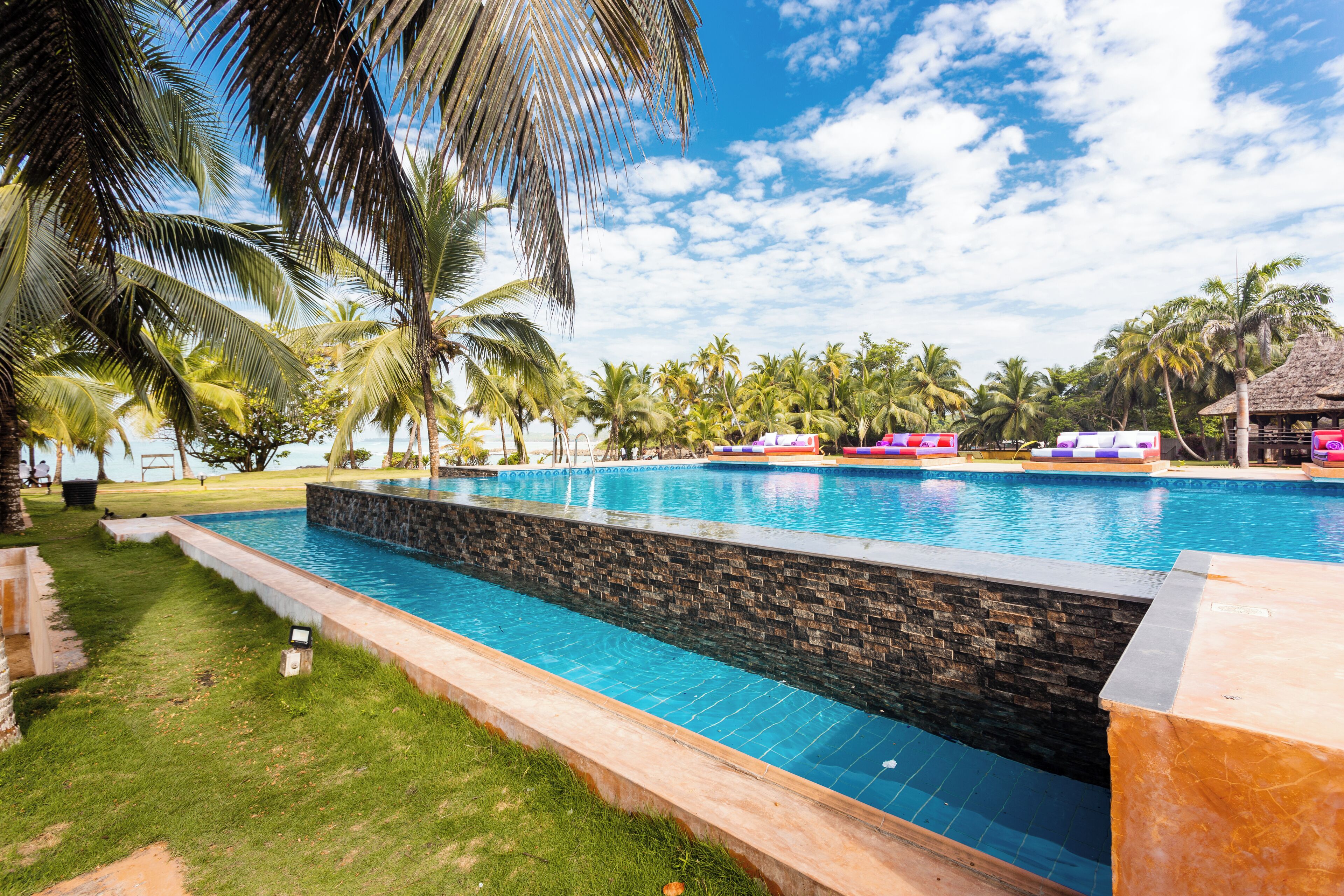 Outdoor pool, free cabanas, pool umbrellas