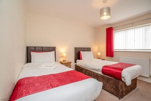 3 bedrooms, iron/ironing board, travel cot, WiFi