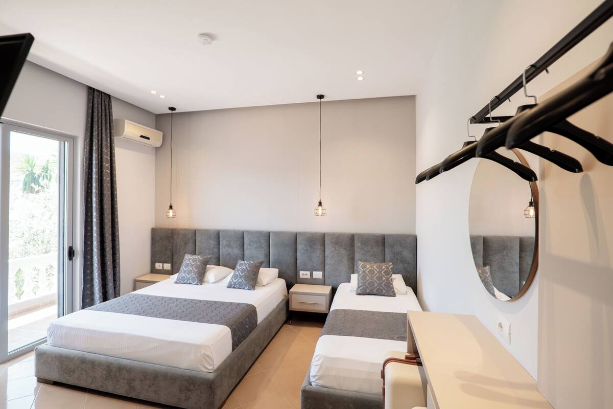 Superior Triple Room, Balcony | Blackout drapes, WiFi (free), bed sheets