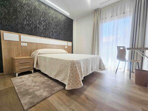Apartment | Hochwertige Bettwaren, Daunenbettdecken, individuell dekoriert