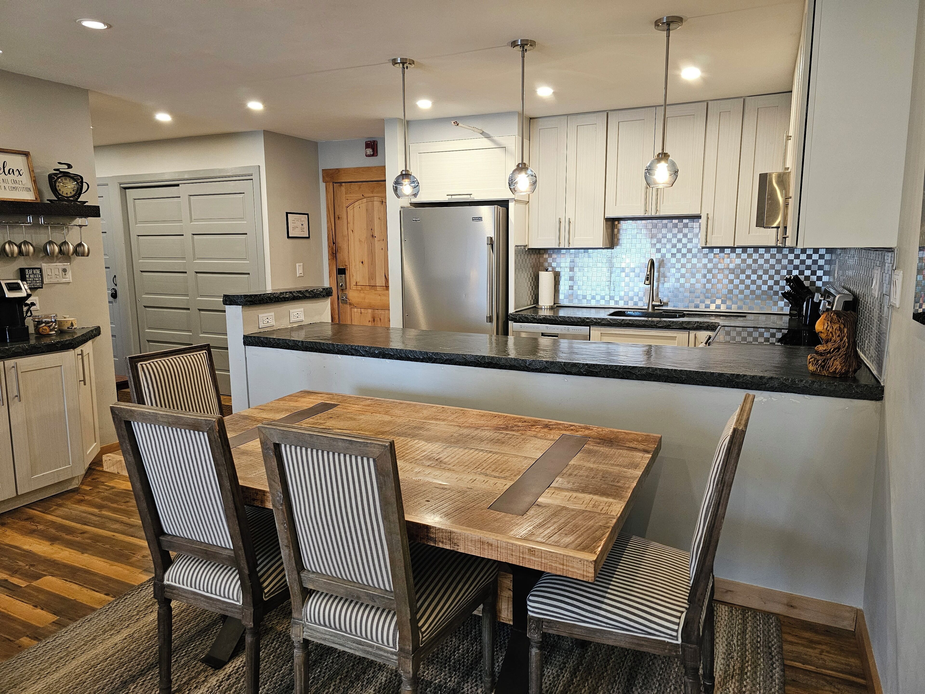 Dining area with 4 chairs and bench for 2