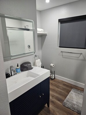 Shower, hair dryer, towels, soap