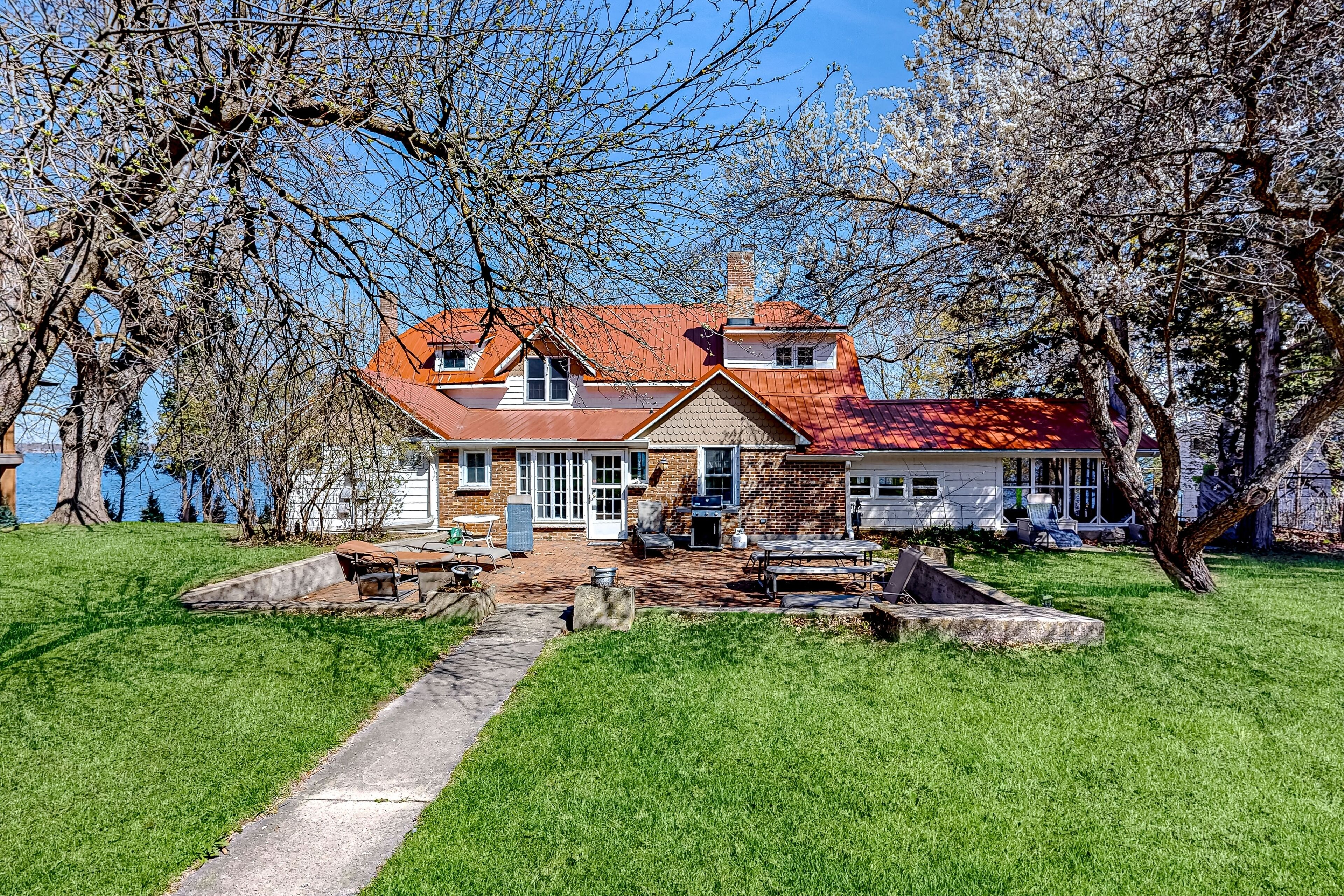 Green Lake Getaway with Rust | private piers, grill, & patios