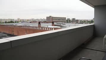 Apartamento premium, vista para o parque | Terraço/pátio
