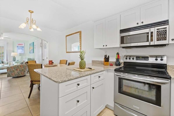 Fridge, microwave, oven, stovetop - Ground Floor | Oceanfront Patio | Resort Style | P (Cape Canaveral)