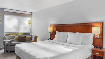 Suite, 1 King Bed, Non Smoking | Individually furnished, desk, soundproofing, iron/ironing board