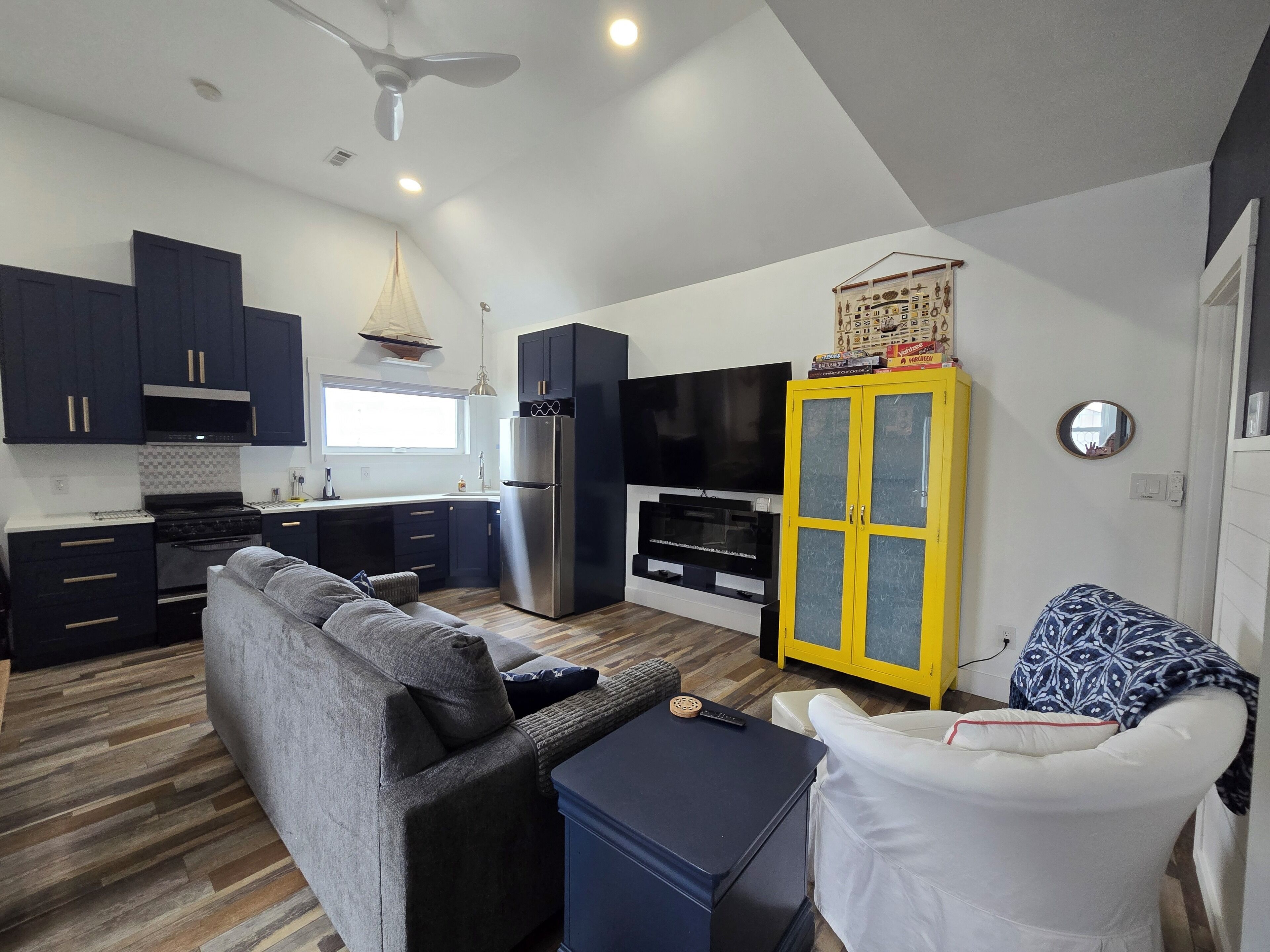 Smart TV, fireplace, books