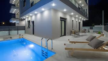 Junior Suite, Private Pool | Living area | 50-inch LED TV with premium channels