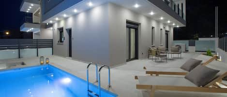 Suite Junior, piscine privée | Coin séjour