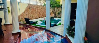 Gorgeous 4 bedroom 5 bed Mini Mansion
With Pool