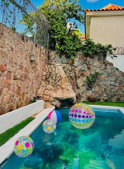 Gorgeous 4 bedroom 5 bed Mini Mansion
With Pool