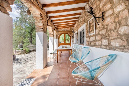Outdoor dining. Holiday Home 'Can Favo' with Mountain View, Private Pool and Air Conditioning