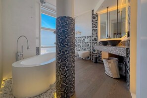 Shower, jetted tub, hair dryer, bidet