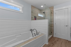 Shower, jetted tub, towels