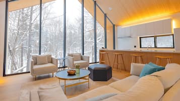 Comfort Chalet, Mountain View | Living area | Flat-screen TV