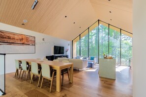 Comfort Chalet, Mountain View | Living area | Flat-screen TV - Kouzan Woods (Niseko)