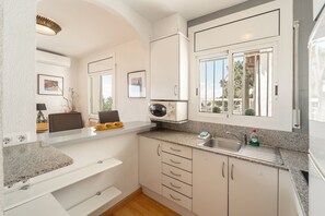 Fridge, microwave, coffee/tea maker, electric kettle