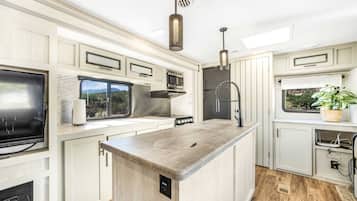 Fridge, microwave, coffee/tea maker, toaster