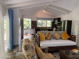 Comfort Apartment, 1 King Bed with Sofa bed, Non Smoking, Mountain View | Living area | 32-inch flat-screen TV with cable channels, books, printers