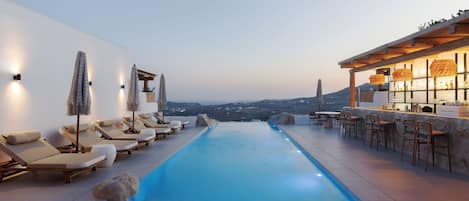 Seasonal outdoor pool, pool umbrellas, pool loungers