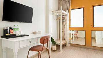 Desk, laptop workspace, free WiFi, bed sheets