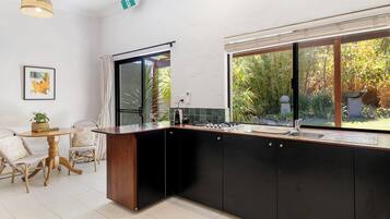 Fridge, microwave, stovetop, coffee/tea maker