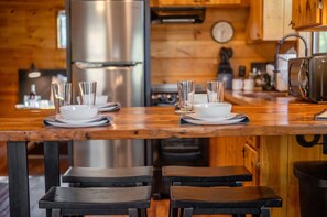 Fridge, microwave, stovetop, cookware/dishes/utensils