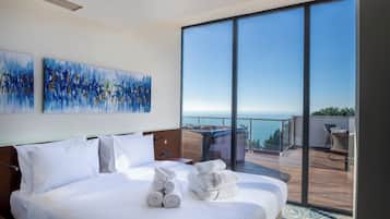 Suite Royal, vista al mar | Ropa de cama de alta calidad y minibar