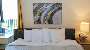 Condo, Multiple Beds, Balcony, Garden View | 2 bedrooms, individually decorated, individually furnished