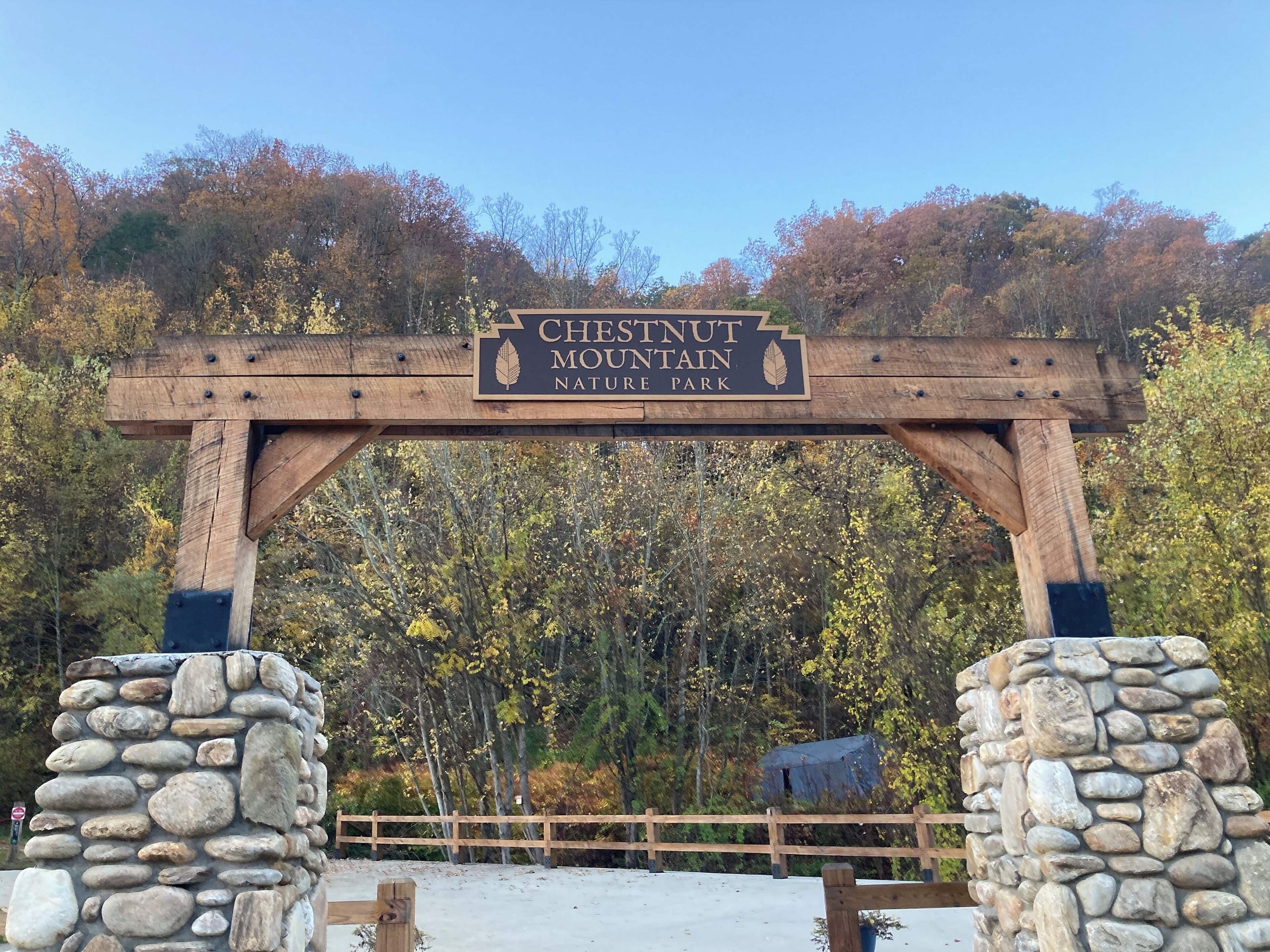 A wooden archway with a sign reading "Chestnut Mountain Nature Park".