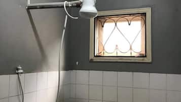 Economy Shared Dormitory, City View | Bathroom | Shower, rainfall showerhead, bidet, towels