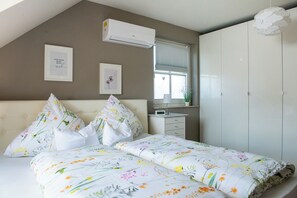 2 chambres, fer et planche à repasser, Wi-Fi, draps fournis