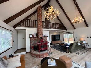 Smart TV, fireplace, DVD player, books