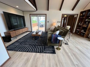 Smart TV, fireplace, DVD player, books