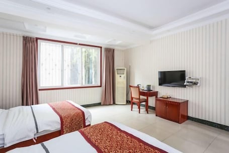 Habitación. Xinping Hotel