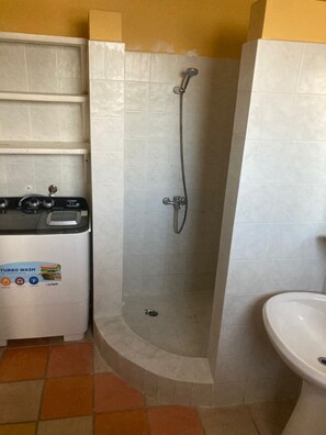 Shower, towels, soap, shampoo