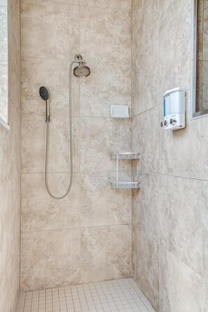 Shower, hair dryer, towels, toilet paper