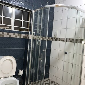 Shower, hair dryer, towels, soap